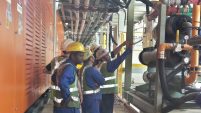 Workers analysing our HVAC System